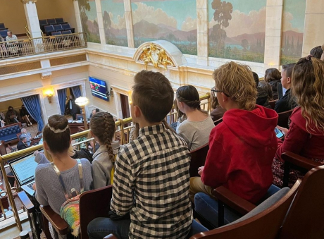 Students listening to a live session at the capital