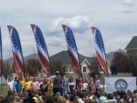Kids singing songs for the arbor day celebration 