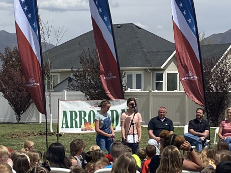 kids reciting poems for the arbor day celebration