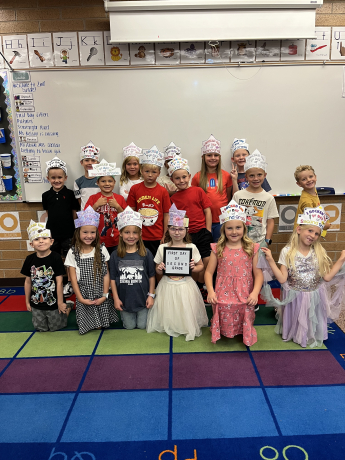 A class wearing their handmade hat for the first day of school