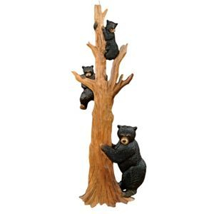 bears climbing a tree